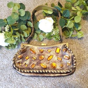 Exotic golden Tianni purse